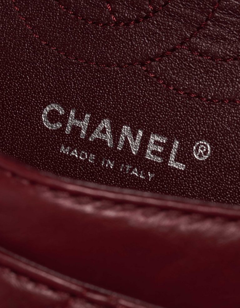 Pre-owned Chanel bag 2.55 Reissue 224 Lamb Dark Red Red Logo | Sell your designer bag on Saclab.com