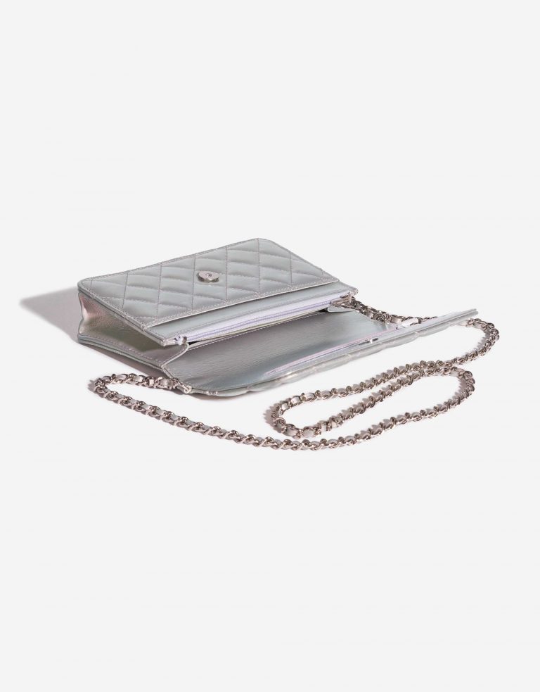 Pre-owned Chanel bag Timeless WOC Lamb Silver Iridescent Silver Inside | Sell your designer bag on Saclab.com