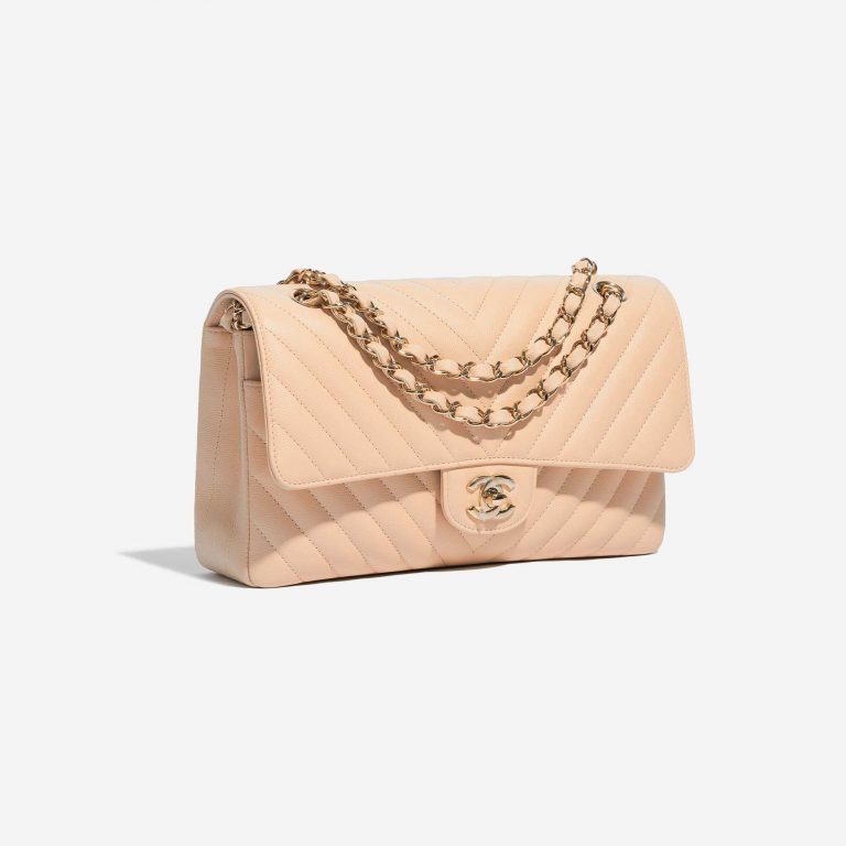 Pre-owned Chanel bag Timeless Medium Caviar Nude Beige Side Front | Sell your designer bag on Saclab.com