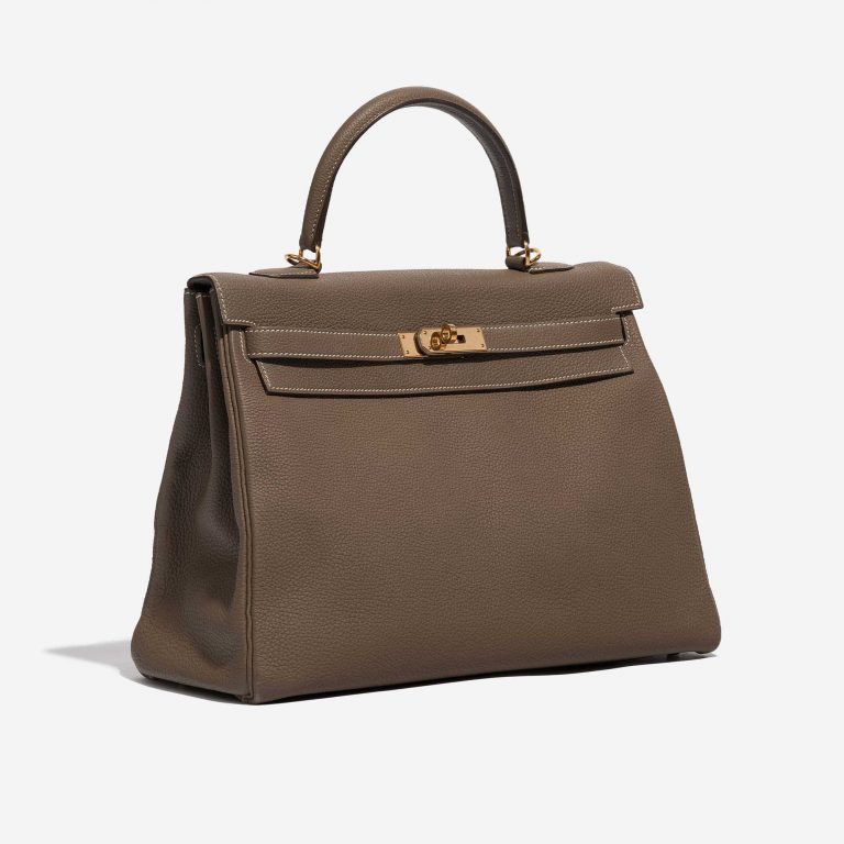 Pre-owned Hermès bag Kelly 35 Togo Etoupe Brown Side Front | Sell your designer bag on Saclab.com