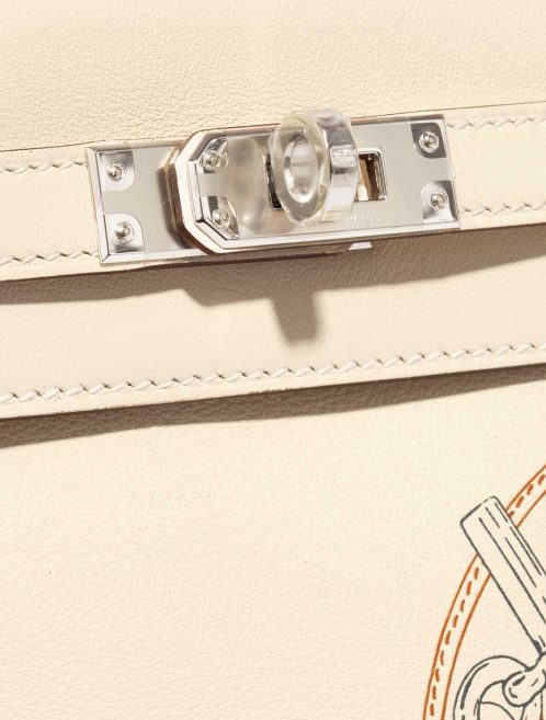 Pre-owned Hermès bag Kelly 25 Swift Nata In & Out Beige, White Closing System | Sell your designer bag on Saclab.com
