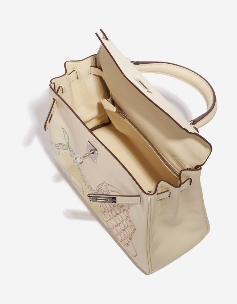Pre-owned Hermès bag Kelly 25 Swift Nata In & Out Beige, White Inside | Sell your designer bag on Saclab.com