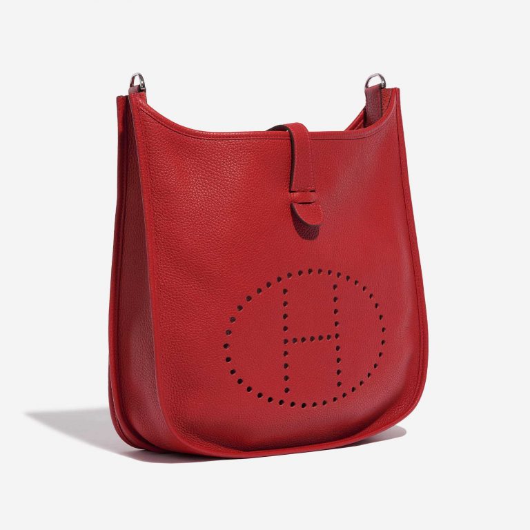 Pre-owned Hermès bag Evelyne 33 Taurillon Clemence Rouge Casaque Red Side Front | Sell your designer bag on Saclab.com