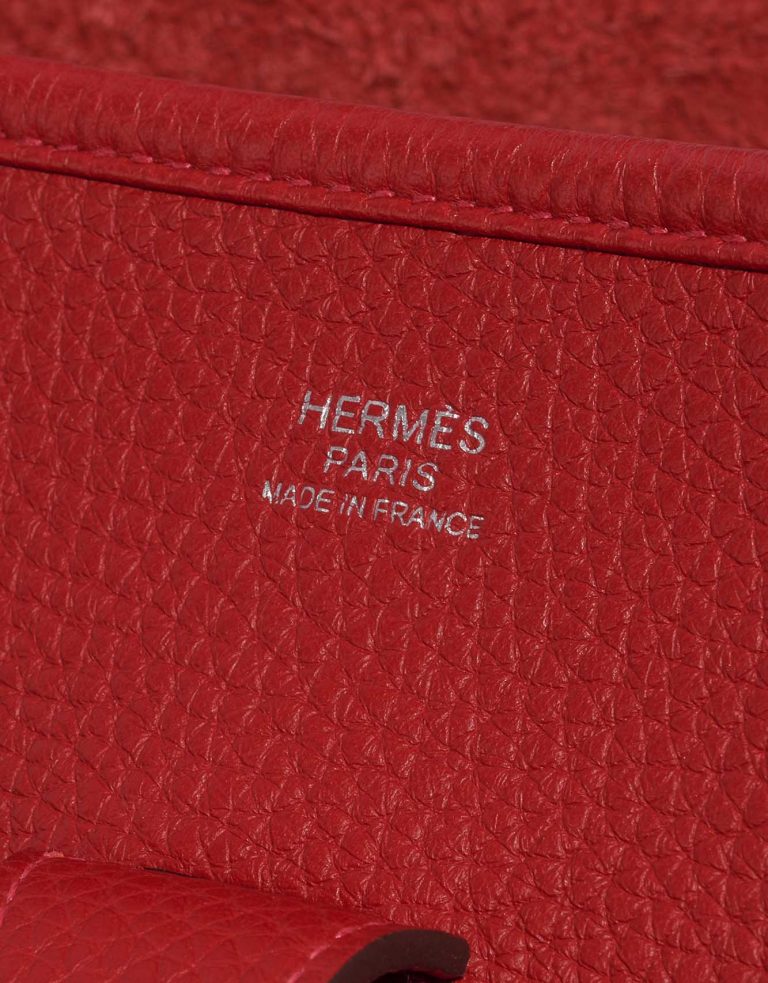 Pre-owned Hermès bag Evelyne 33 Taurillon Clemence Rouge Casaque Red Logo | Sell your designer bag on Saclab.com
