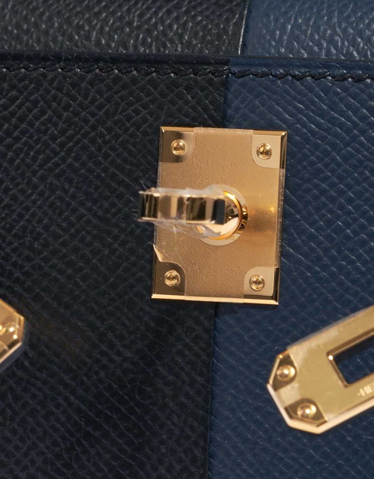 Pre-owned Hermès bag Kelly Mini Epsom Blue Indigo / Black / Rouge Casaque Black, Blue Logo | Sell your designer bag on Saclab.com