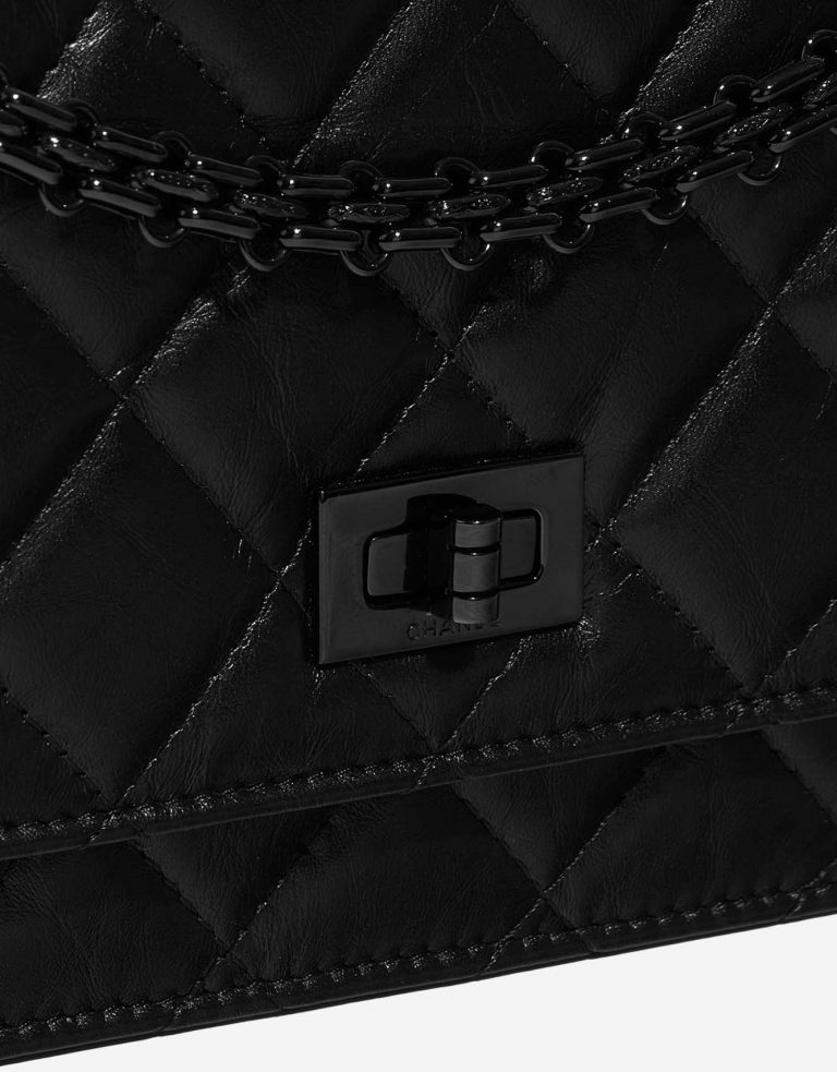 Pre-owned Chanel bag 2.55 Reissue WOC Lambskin Black Black Closing System | Sell your designer bag on Saclab.com