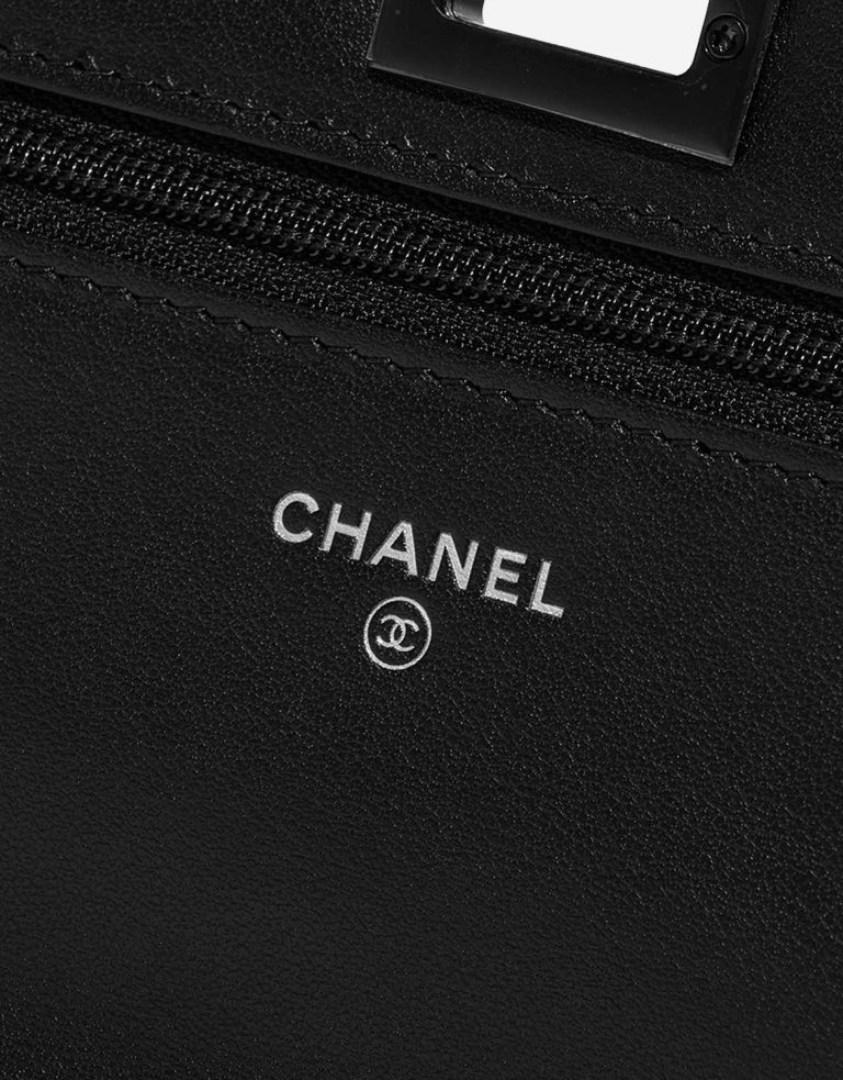 Pre-owned Chanel bag 2.55 Reissue WOC Lambskin Black Black Logo | Sell your designer bag on Saclab.com