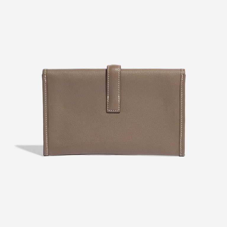Pre-owned Hermès bag Jige Clutch Mini Chevre Etoupe Brown Back | Sell your designer bag on Saclab.com