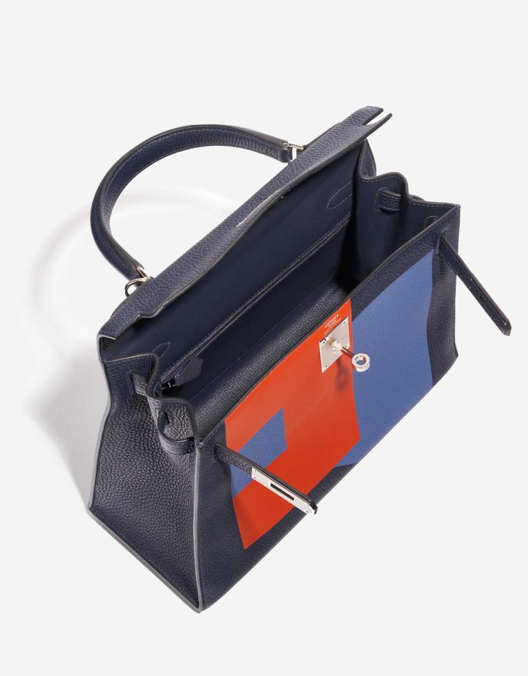 Pre-owned Hermès bag Kelly 28 Lettre R Clemence / Tadelakt Blue Nuit / Blue Brighton / Terre Battue Blue, Multicolour Inside | Sell your designer bag on Saclab.com