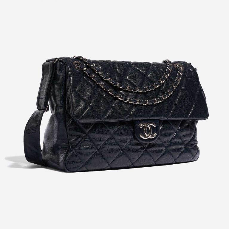 Pre-owned Chanel bag Timeless Special Edition Caviar Dark Blue Blue Side Front | Sell your designer bag on Saclab.com
