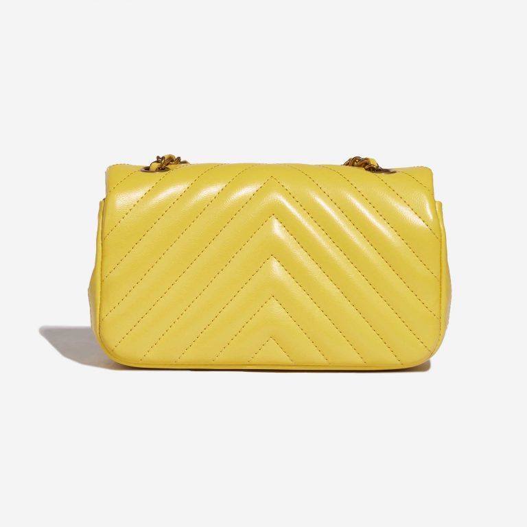 Pre-owned Chanel bag Timeless Extra Mini Chevron Lamb Yellow Yellow Back | Sell your designer bag on Saclab.com