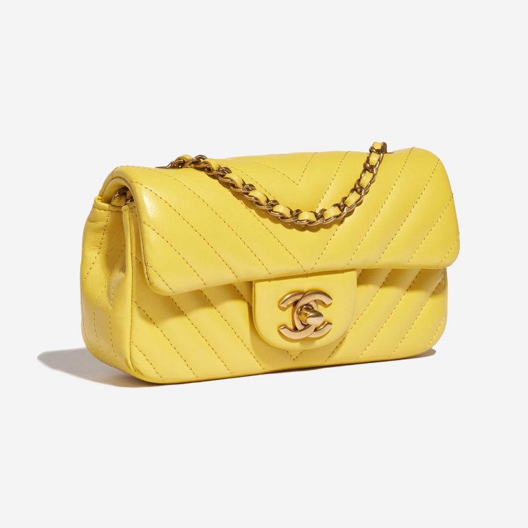 Pre-owned Chanel bag Timeless Extra Mini Chevron Lamb Yellow Yellow Side Front | Sell your designer bag on Saclab.com