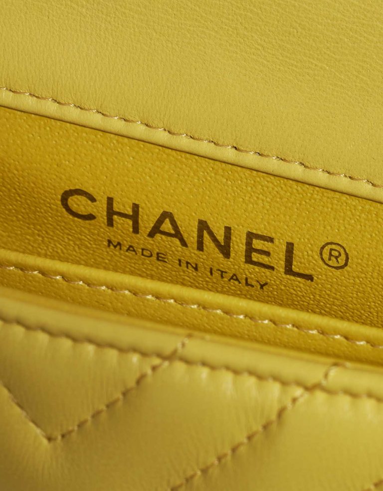 Pre-owned Chanel bag Timeless Extra Mini Chevron Lamb Yellow Yellow Logo | Sell your designer bag on Saclab.com