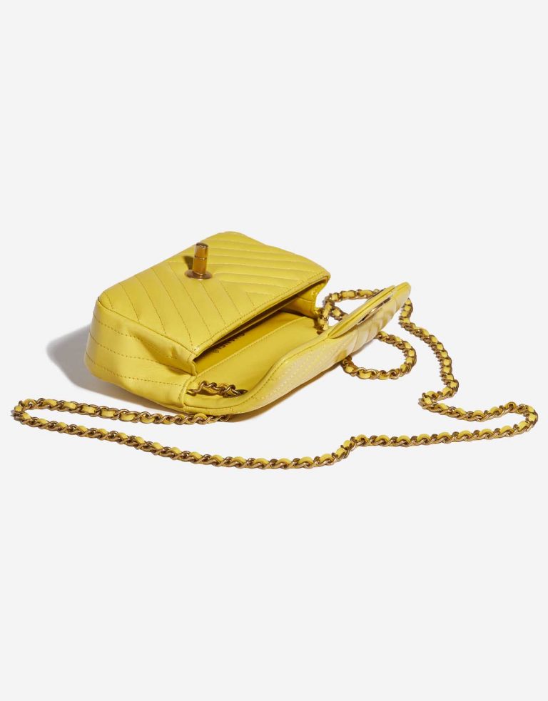 Pre-owned Chanel bag Timeless Extra Mini Chevron Lamb Yellow Yellow Inside | Sell your designer bag on Saclab.com