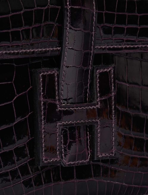 Pre-owned Hermès bag Jige Clutch Shiny Niloticus Crocodile Prunoir Violet Closing System | Sell your designer bag on Saclab.com