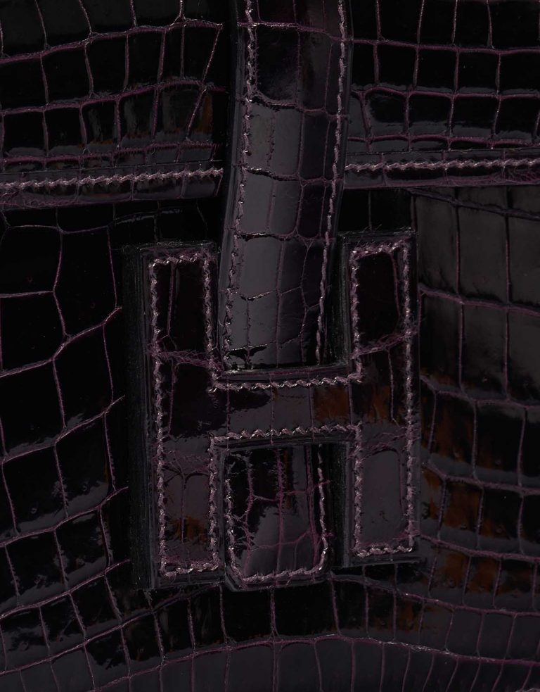 Pre-owned Hermès bag Jige Clutch Shiny Niloticus Crocodile Prunoir Violet Closing System | Sell your designer bag on Saclab.com