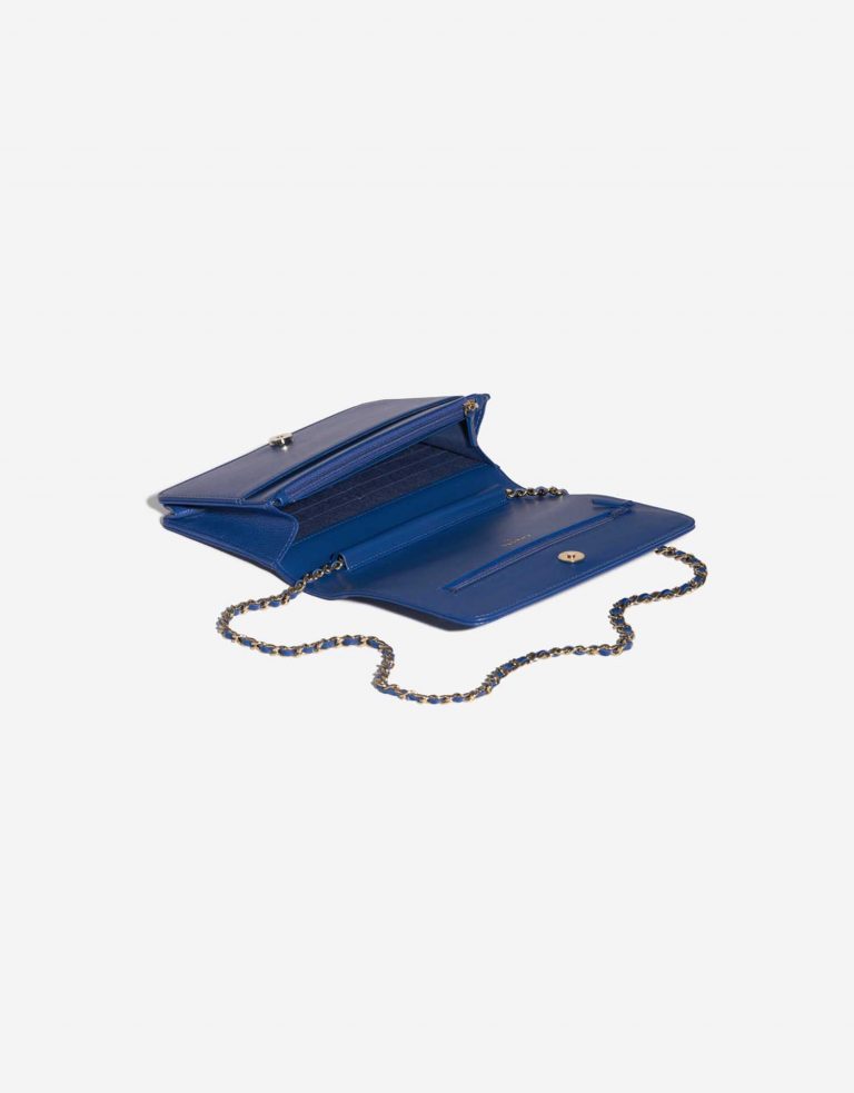 Pre-owned Chanel bag WOC Camellia Lamb Blue Blue Inside | Sell your designer bag on Saclab.com