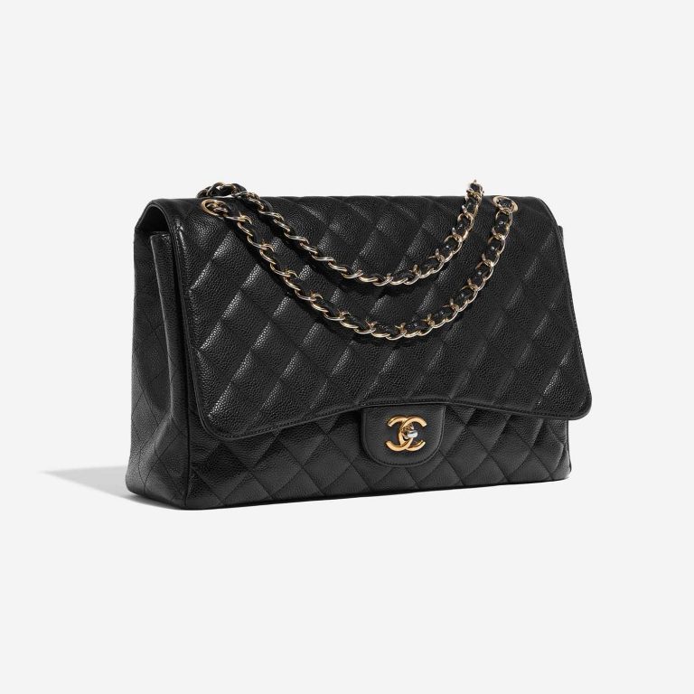 Pre-owned Chanel bag Timeless Maxi Caviar Black Black Side Front | Sell your designer bag on Saclab.com