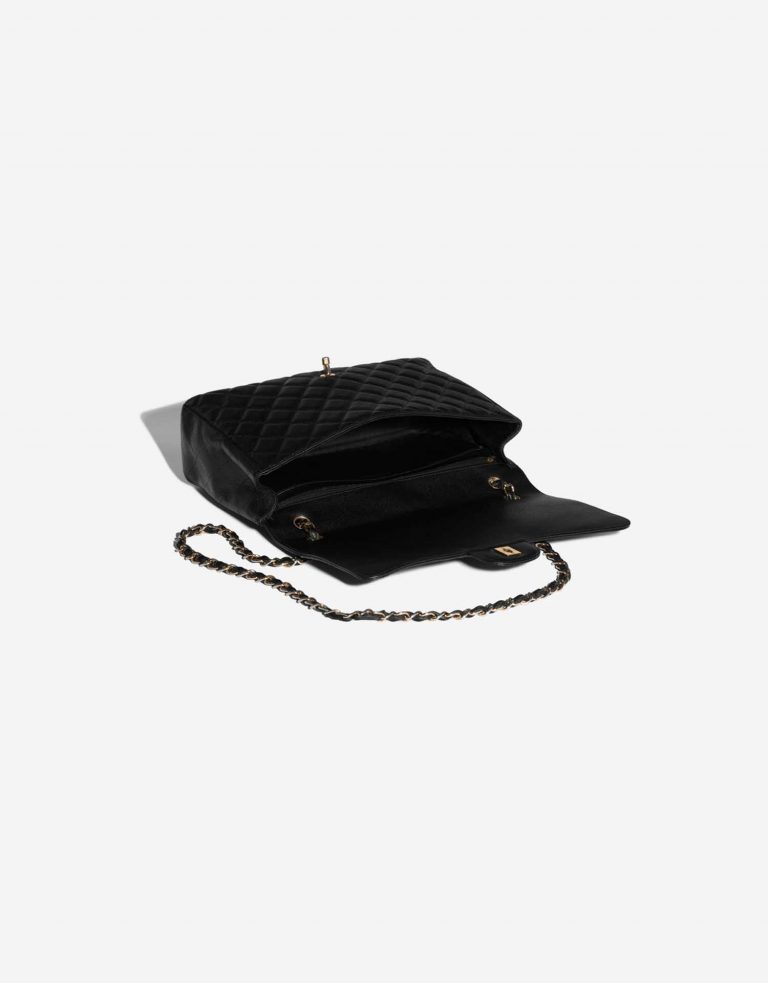 Pre-owned Chanel bag Timeless Maxi Caviar Black Black Inside | Sell your designer bag on Saclab.com