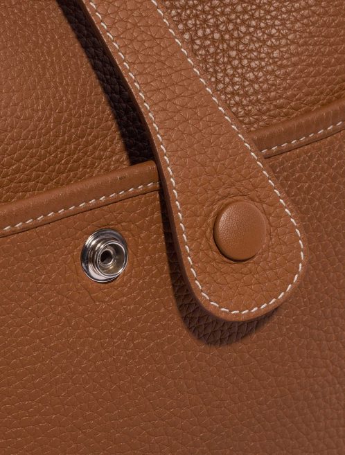 Pre-owned Hermès bag Evelyne 33 Taurillon Clemence Gold Brown Closing System | Sell your designer bag on Saclab.com