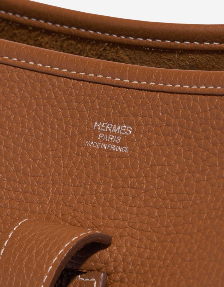 Pre-owned Hermès bag Evelyne 33 Taurillon Clemence Gold Brown Logo | Sell your designer bag on Saclab.com