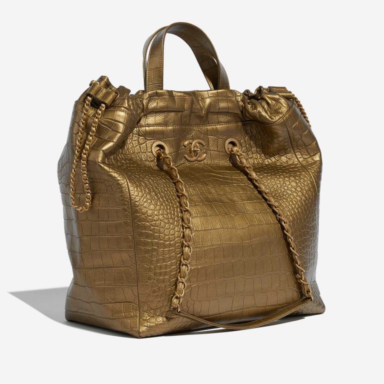 Pre-owned Chanel bag Shopping Tote Calf Gold Gold Side Front | Sell your designer bag on Saclab.com