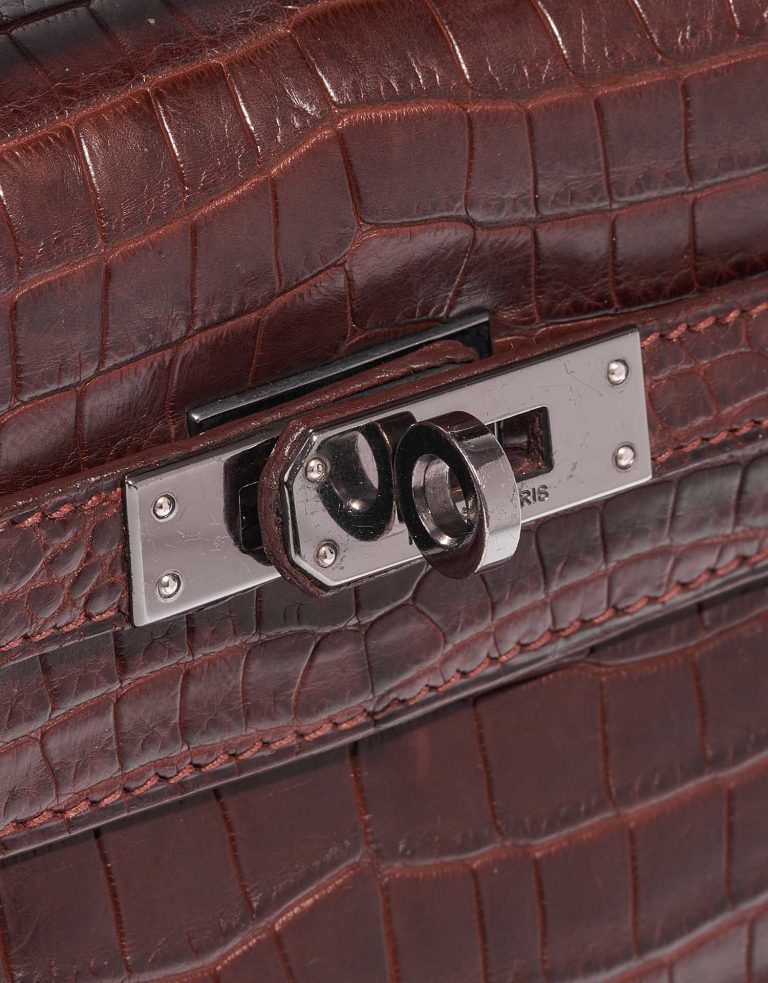 A Hermès Kelly Pochette in Bourgogne on Alligator leather, sold on saclab.com