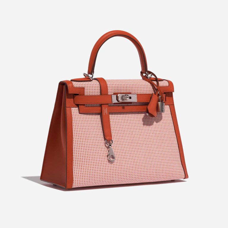 Pre-owned Hermès bag Kelly 28 Toile Quadrille / Swift Terre Battue / Mauve Sylvestre / Blanc Red, Rose, White Side Front | Sell your designer bag on Saclab.com