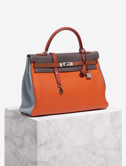 Pre-owned Hermès bag Kelly 35 Harlequin Togo Orange /  Etain / Blue Lin / Sanguine / Blue Hydra / Gold Multicolour, Orange, Red Side Front | Sell your designer bag on Saclab.com