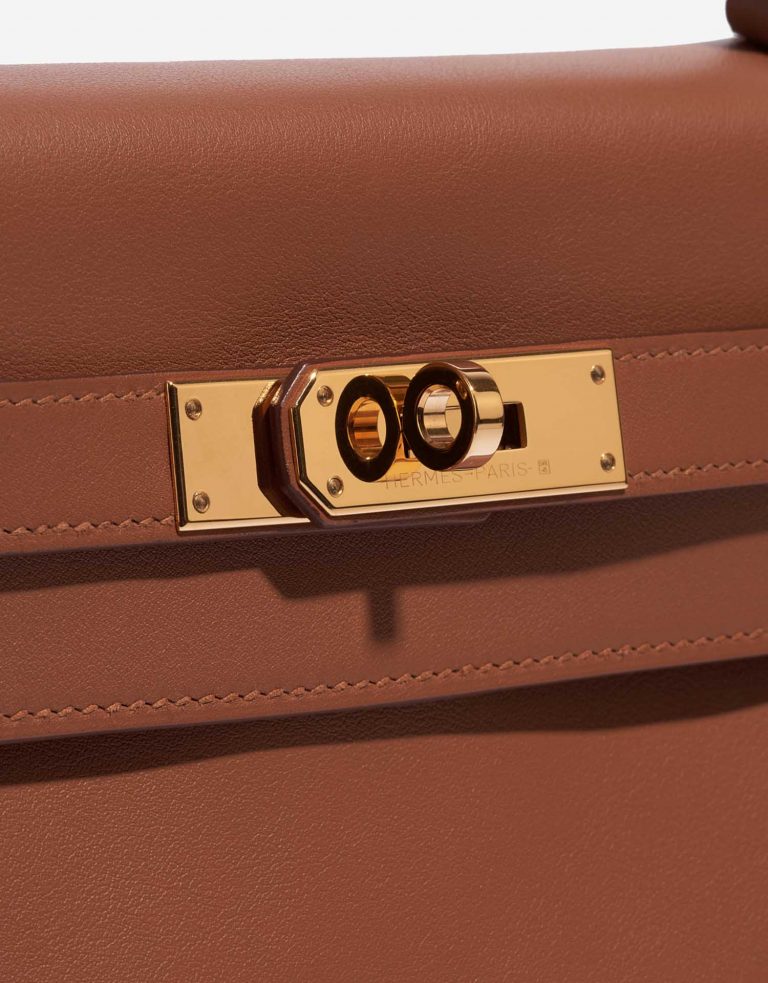Pre-owned Hermès bag Kelly HSS 32 Swift Gold / Apricot Brown Closing System | Sell your designer bag on Saclab.com