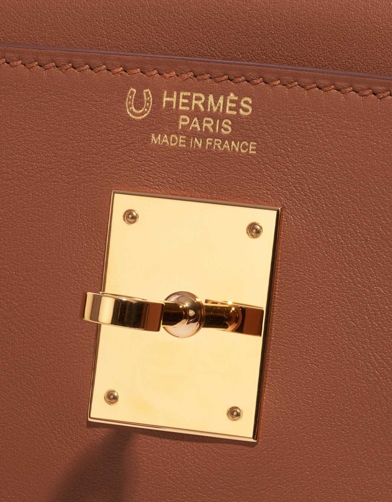 Pre-owned Hermès bag Kelly HSS 32 Swift Gold / Apricot Brown Logo | Sell your designer bag on Saclab.com