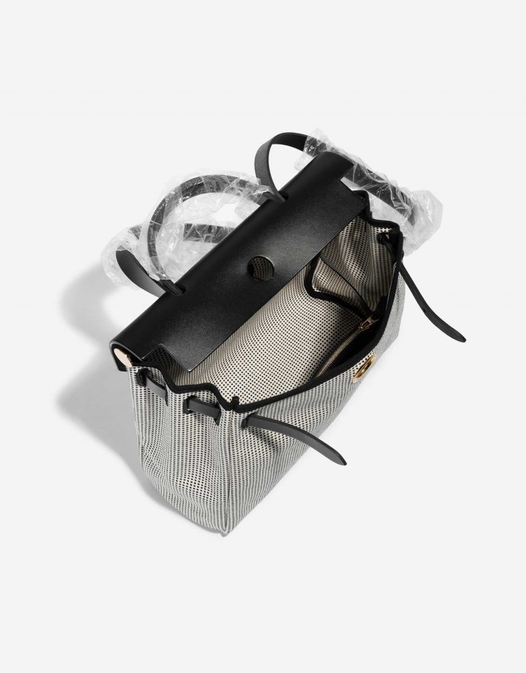 Pre-owned Hermès bag Herbag 31 Vache Hunter / Toile Quadrille Viking Black / White / Ecru Black, White Inside | Sell your designer bag on Saclab.com