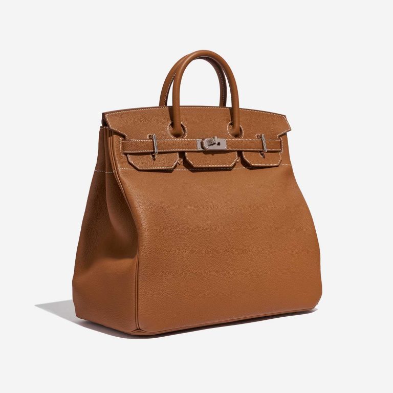 Pre-owned Hermès bag Haut à Courroies 40 Togo Gold Brown Side Front | Sell your designer bag on Saclab.com