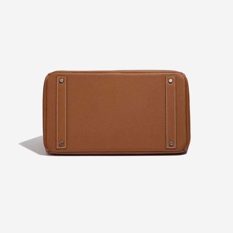 Pre-owned Hermès bag Haut à Courroies 40 Togo Gold Brown Bottom | Sell your designer bag on Saclab.com