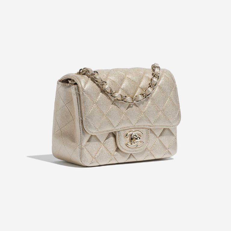 Pre-owned Chanel bag Timeless Mini Square Lamb Gold Gold Side Front | Sell your designer bag on Saclab.com