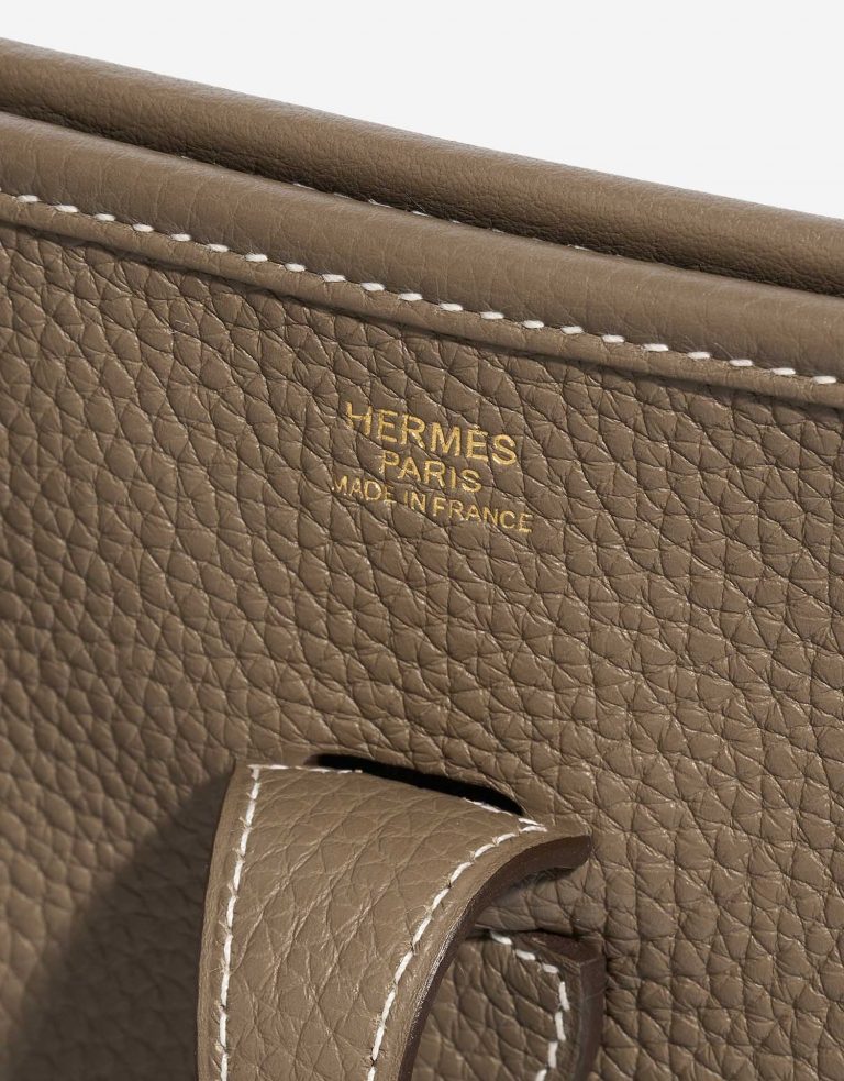 Pre-owned Hermès bag Evelyne 29 Taurillon Clemence Etoupe Beige Logo | Sell your designer bag on Saclab.com