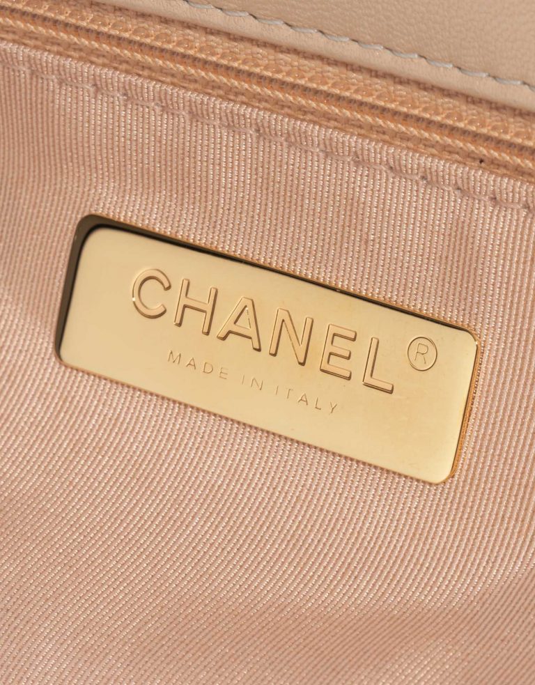 Pre-owned Chanel bag 19 Flap Bag Lamb Beige Beige Logo | Sell your designer bag on Saclab.com