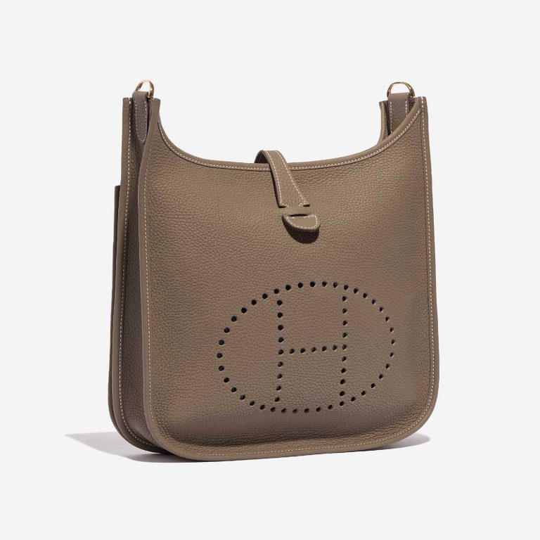 Pre-owned Hermès bag Evelyne 29 Taurillon Clemence Etoupe Brown Side Front | Sell your designer bag on Saclab.com