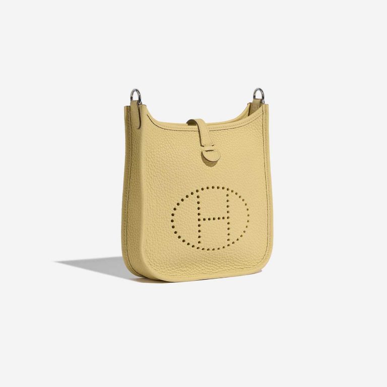 Pre-owned Hermès bag Evelyne 16 Taurillon Clemence Jaune Poussin Yellow Side Front | Sell your designer bag on Saclab.com