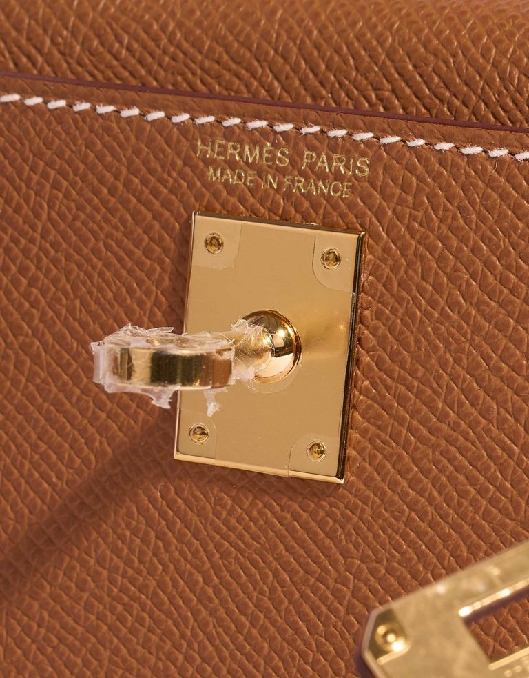 Pre-owned Hermès bag Kelly Mini Gold Logo| Sell your designer bag on Saclab.com