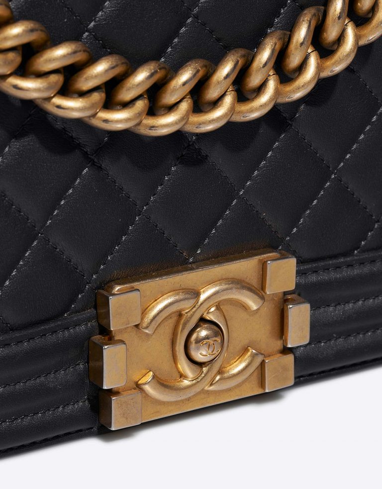 details on a Chanel Boy Old Medium in Dark Plume, sold on saclab.com