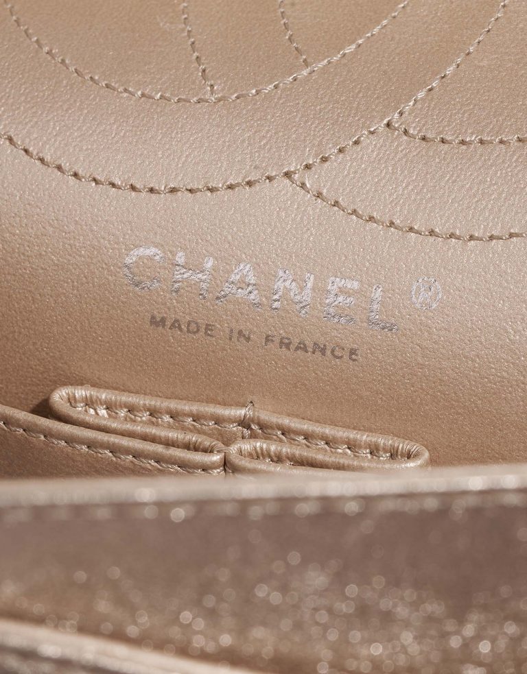 Chanel 255Reissue 226 ShinyChampagne Logo  | Sell your designer bag on Saclab.com