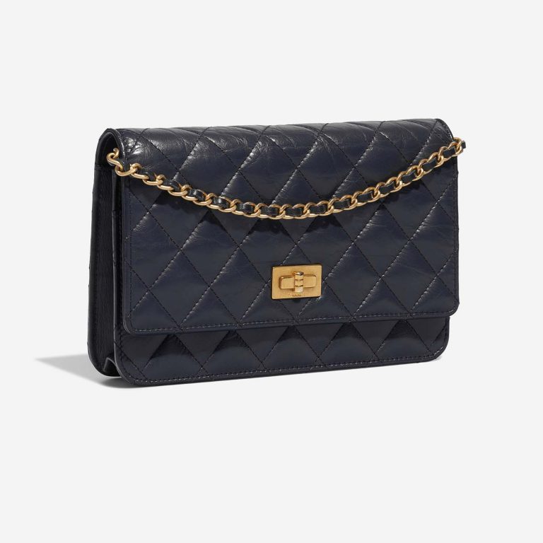 Pre-owned Chanel bag 2.55 Reissue Wallet On Chain Aged Calf Dark Blue Blue | Sell your designer bag on Saclab.com