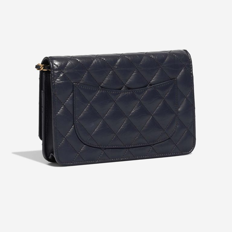 Pre-owned Chanel bag 2.55 Reissue Wallet On Chain Aged Calf Dark Blue Blue | Sell your designer bag on Saclab.com