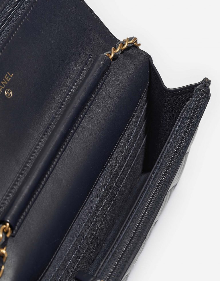 Pre-owned Chanel bag 2.55 Reissue Wallet On Chain Aged Calf Dark Blue Blue | Sell your designer bag on Saclab.com