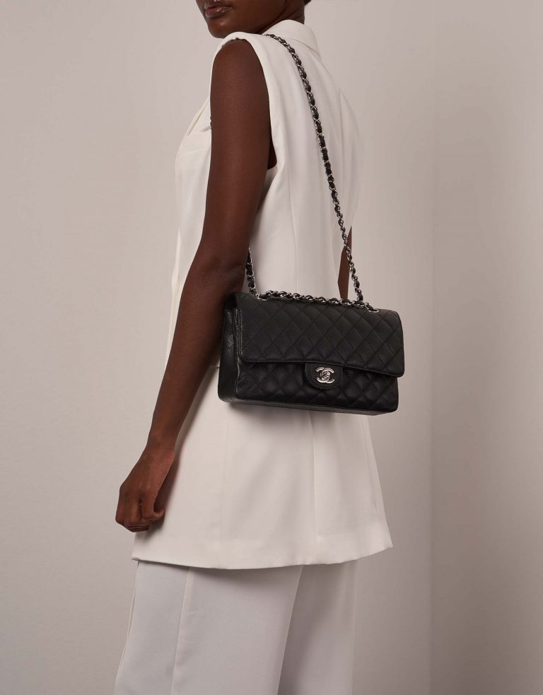 Chanel Timeless Medium Black on Model | Sell your designer bag on Saclab.com