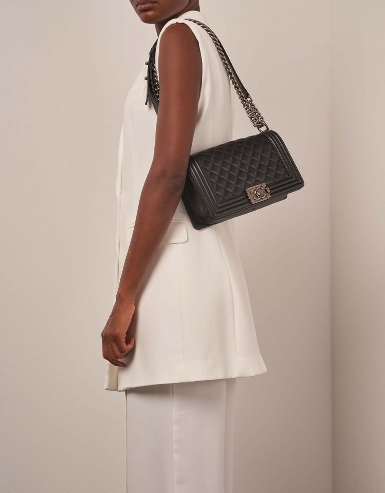 Chanel Boy OldMedium Black on Model | Sell your designer bag on Saclab.com