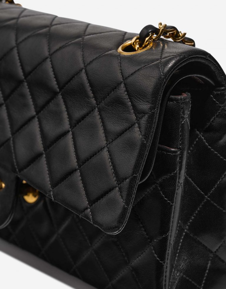 Chanel Timeless Medium Black signs of wear 1 | Sell your designer bag on Saclab.com
