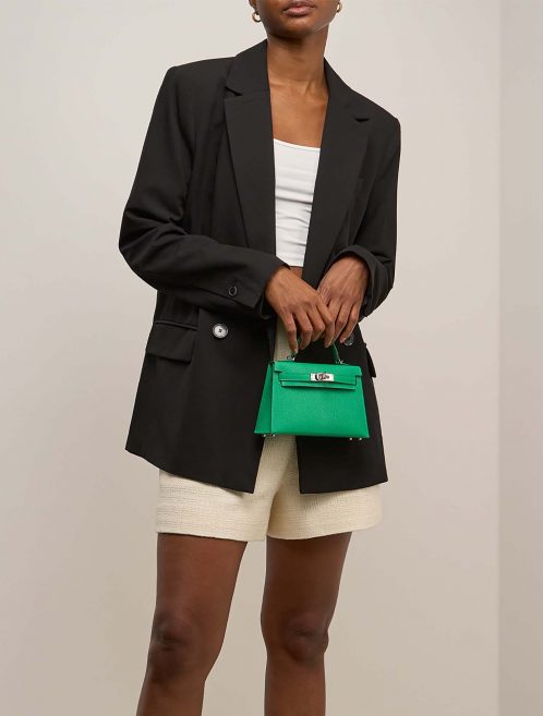 Hermès Kelly Mini Menthe on Model | Sell your designer bag on Saclab.com