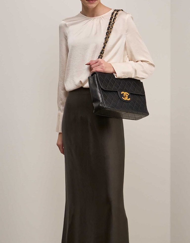 Chanel Timeless Jumbo Black on Model | Sell your designer bag on Saclab.com